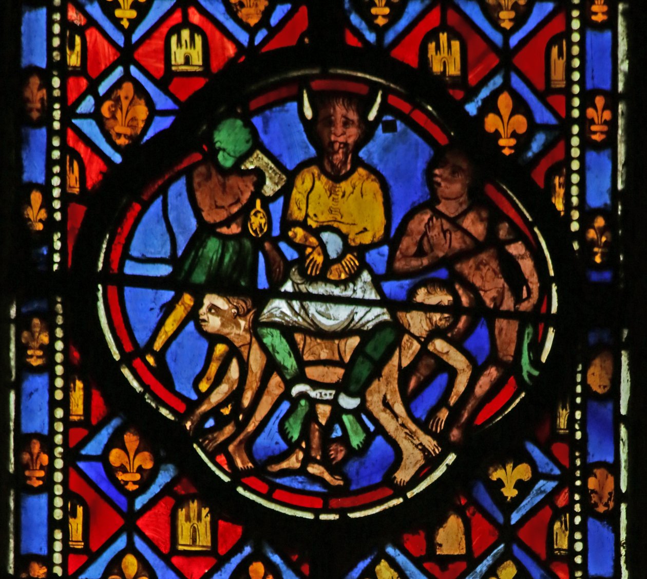Fönster som föreställer Satan i sin domstol av French School