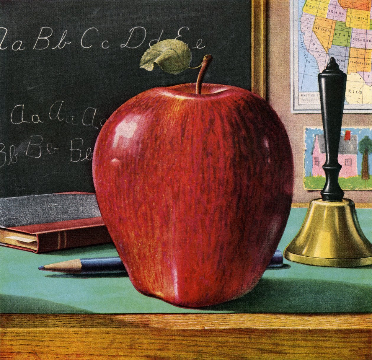 Red Delicious-äpple på en lärares skrivbord av American School