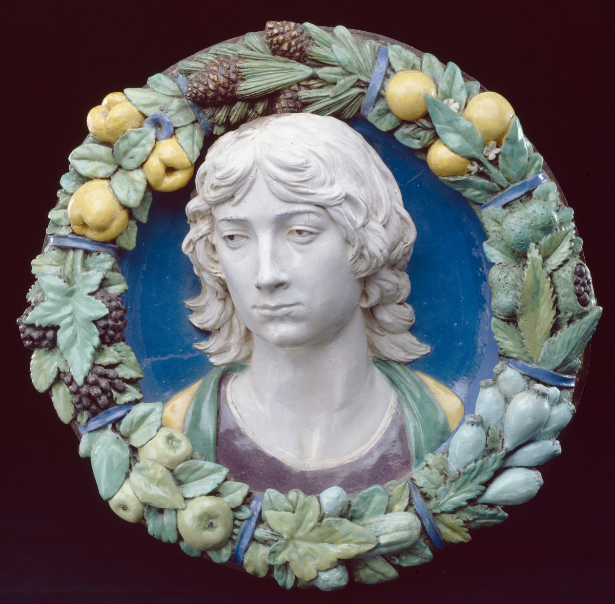 Head of a Youth (emaljerad terrakotta) av Andrea Della Robbia