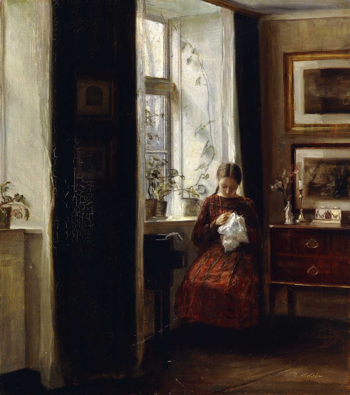 En ung flicka som syr av Carl Holsoe