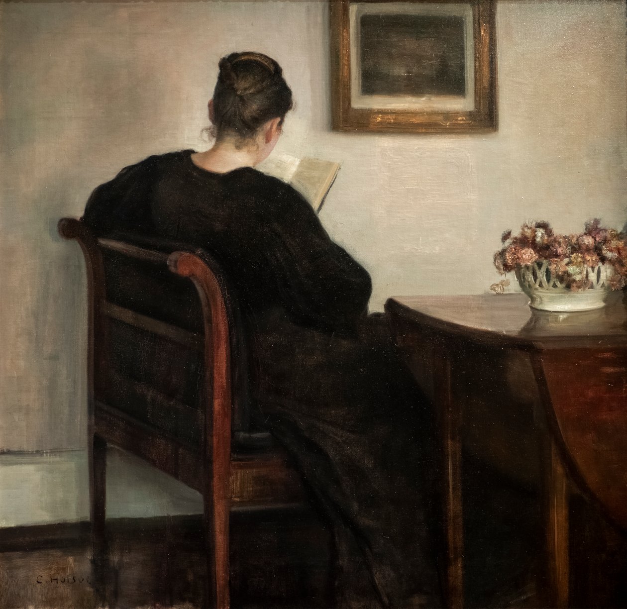 Interiör, läsande kvinna av Carl Holsoe