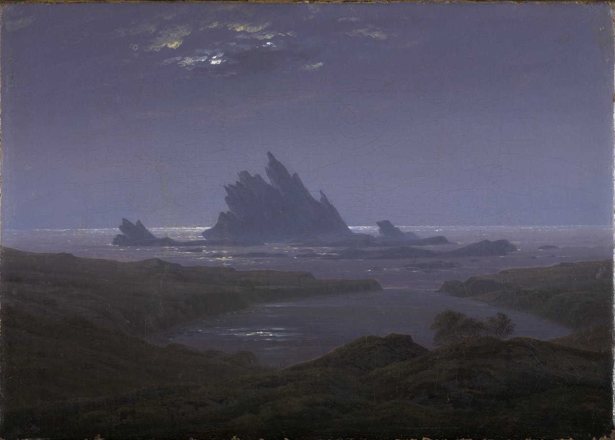 Stenrev på havsstranden av Caspar David Friedrich