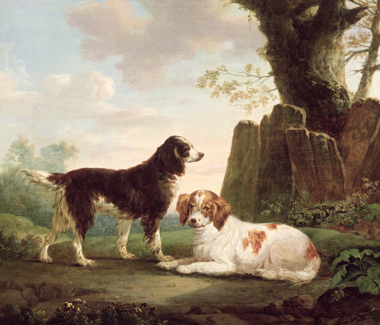 To spaniels i en landskabssven av Charles Towne