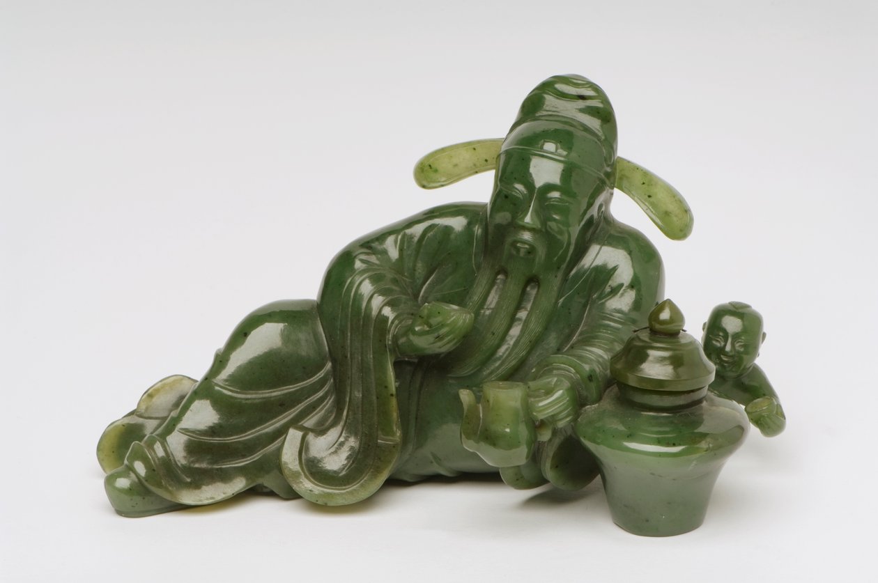 Liggande kinesisk forskarfigur (jade) av Chinese School