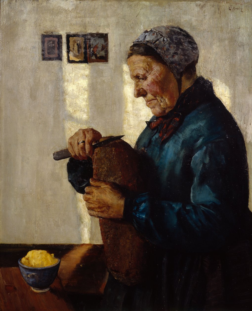 Fru som skär bröd av Christian Krohg