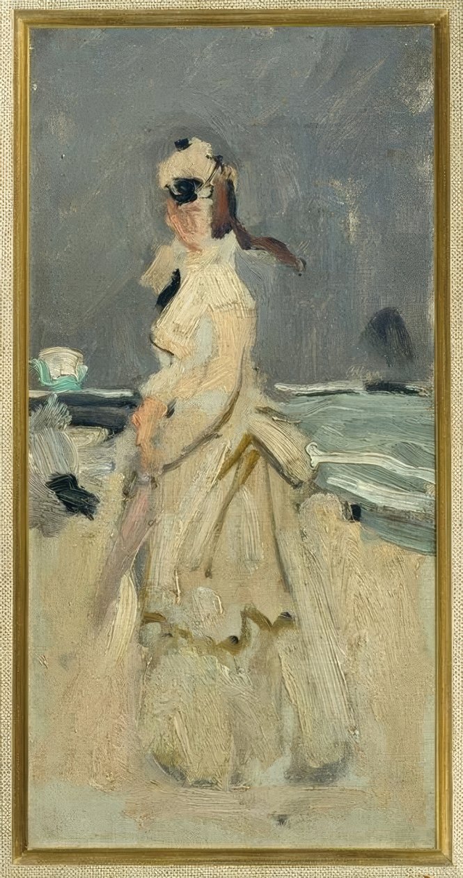 Camille på stranden av Claude Monet