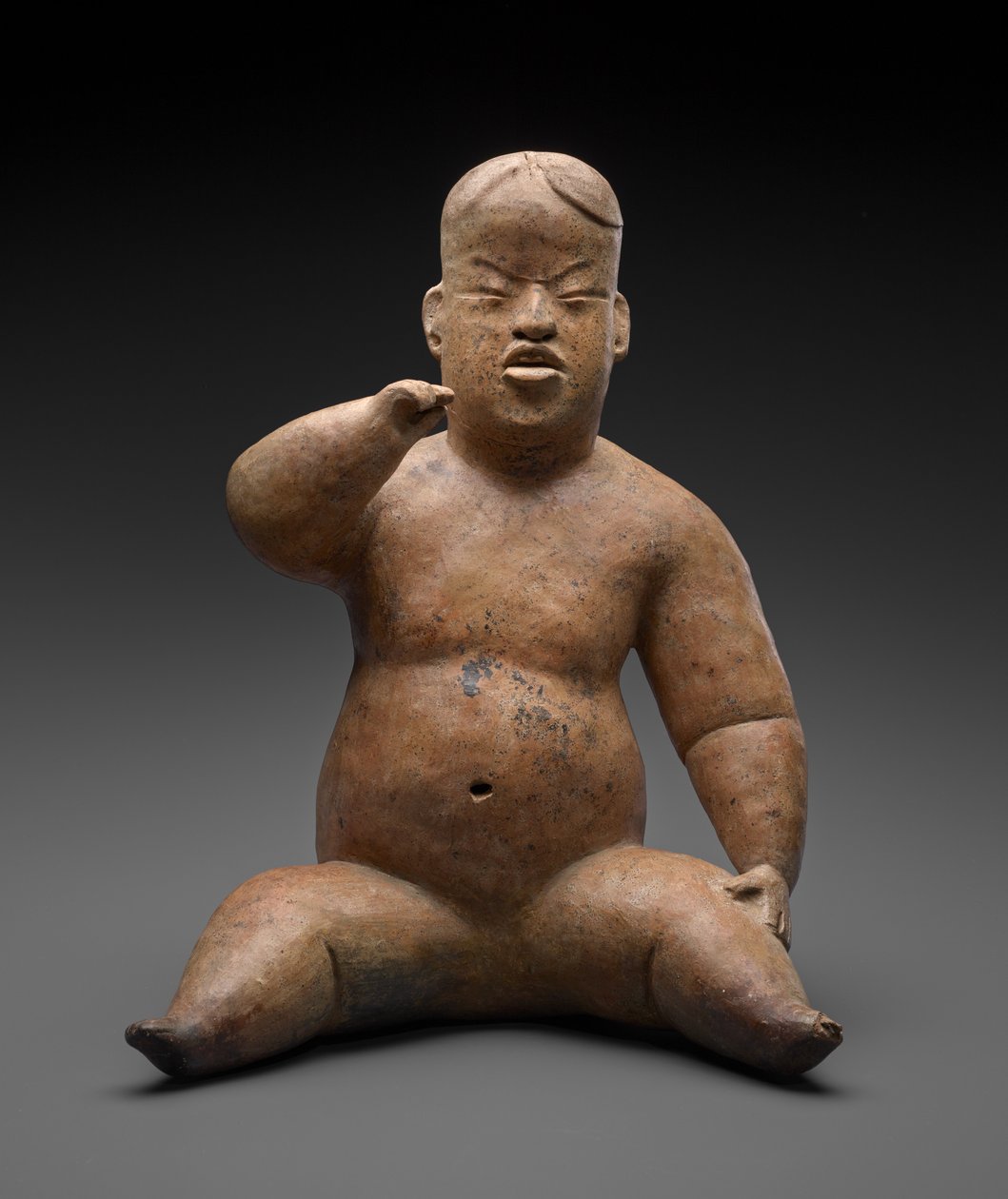 Sittande figur av Culture Olmec