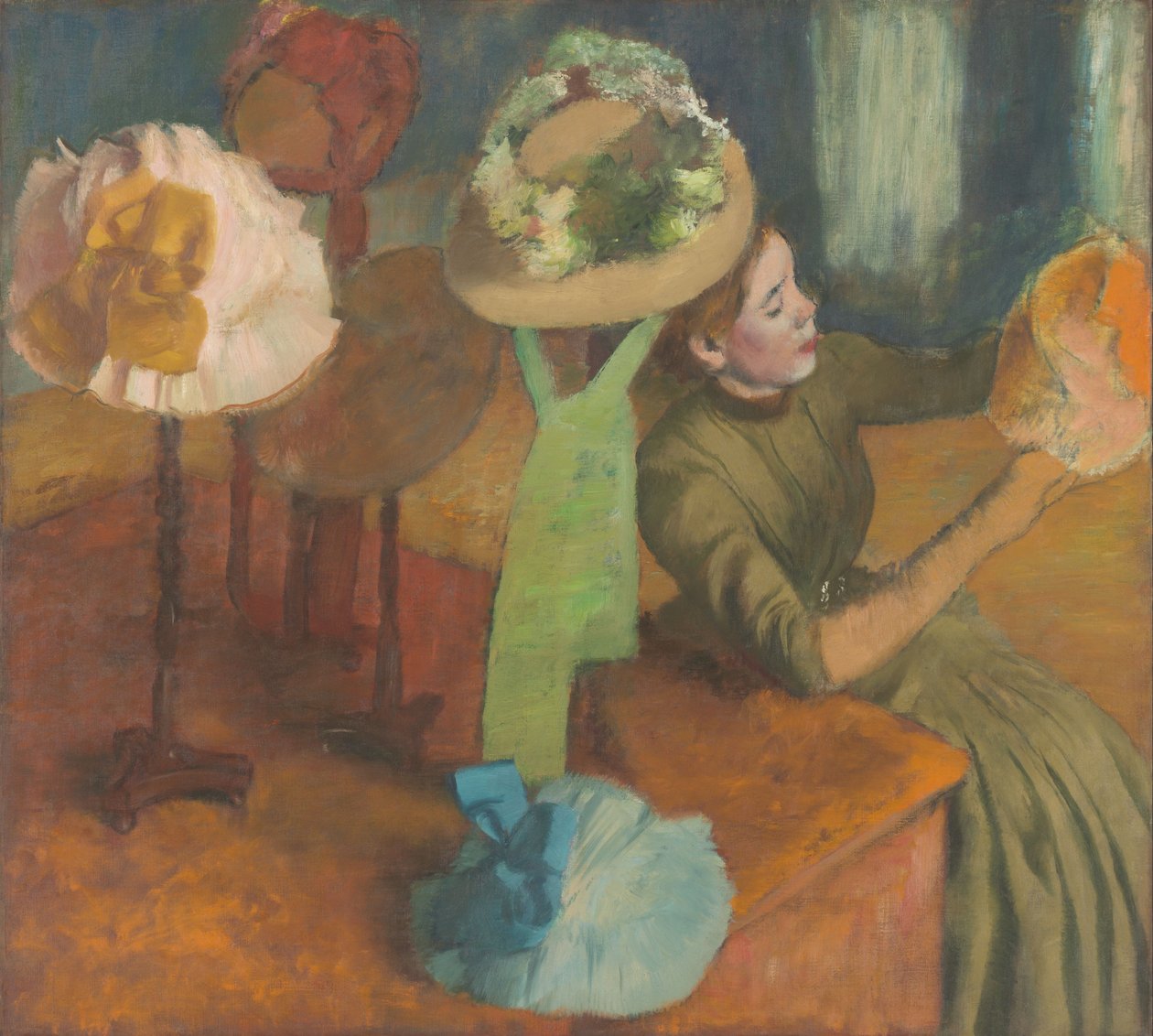 The Millinery Shop av Edgar Degas