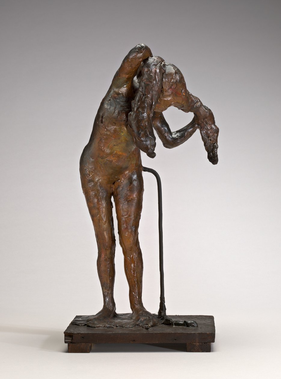 Kvinna som arrangerar sitt hår, möjligen sent 1880-1890-tal. av Edgar Degas
