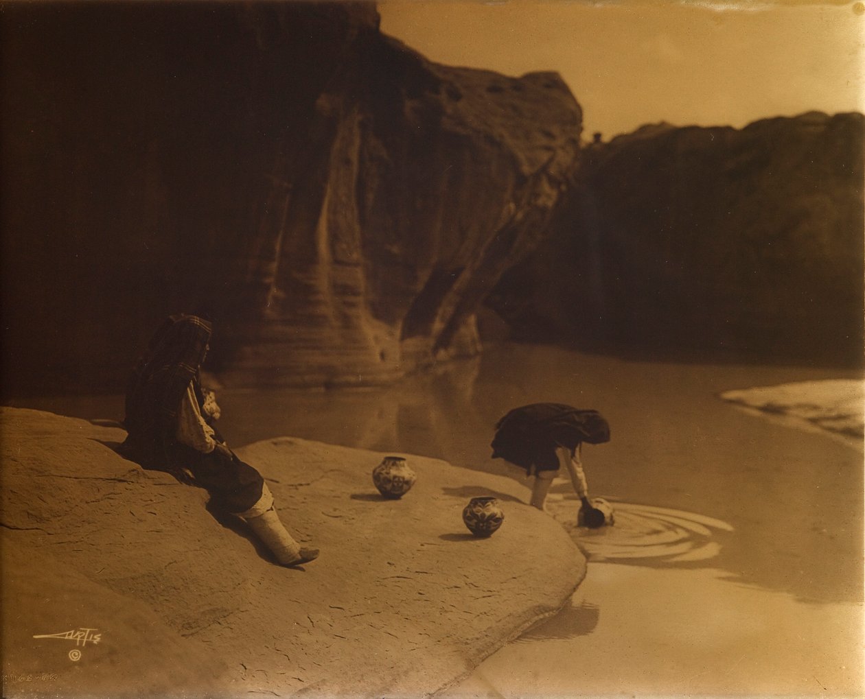 Vid den gamla brunnen i Acoma av Edward S. Curtis