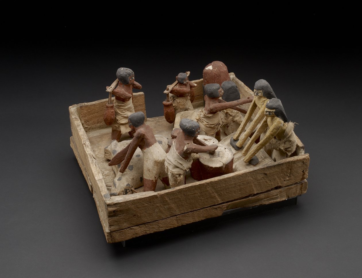 Modell som visar aktiviteter för att baka, brygga och slakta trä, gesso och färg av Egyptian 12th Dynasty