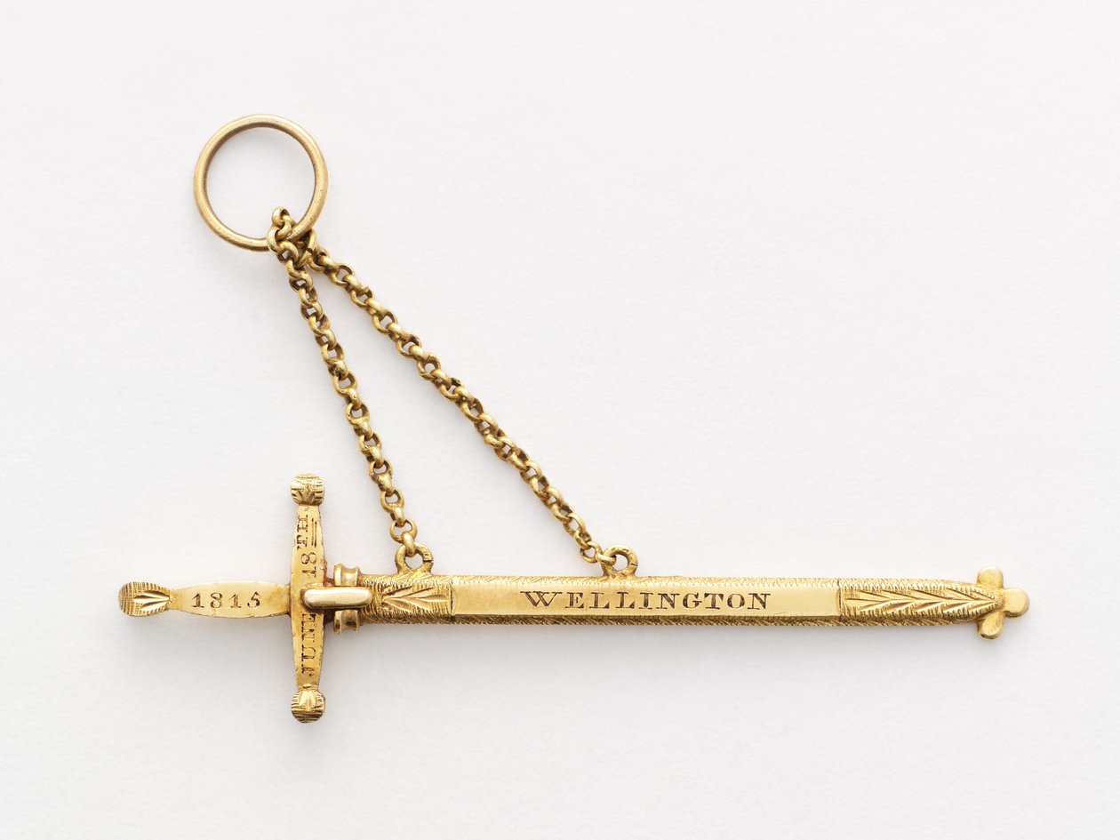Miniatyr jubileumssvärd (trä och guld) av English School