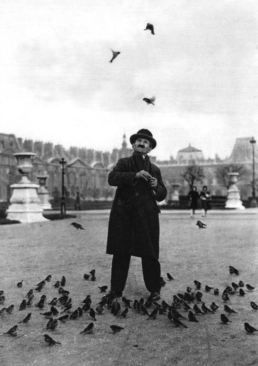 En fågeltjusare, Paris, 1931. av Ernest Flammarion