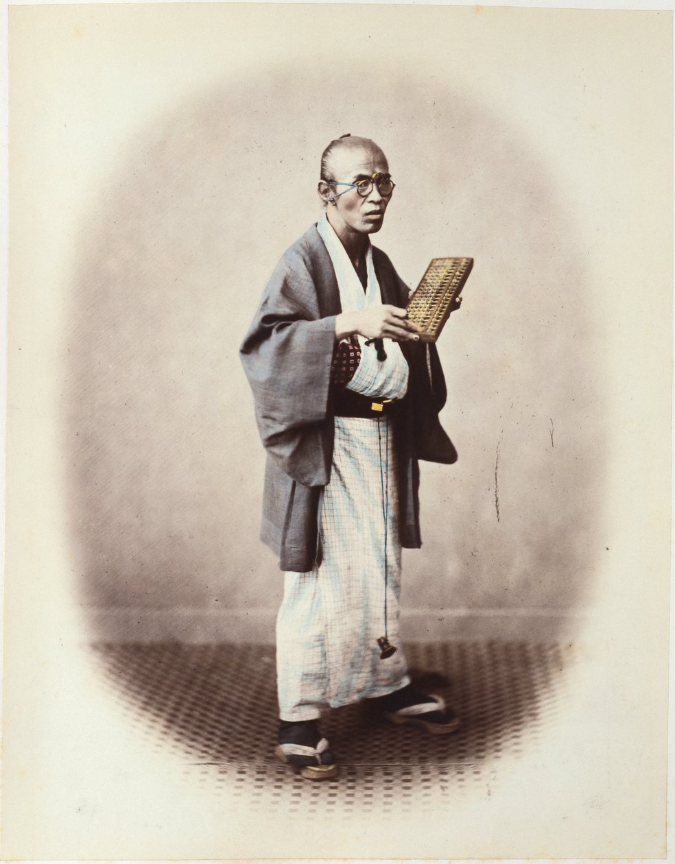 En kontorist, ca 1868 av Felice Beato