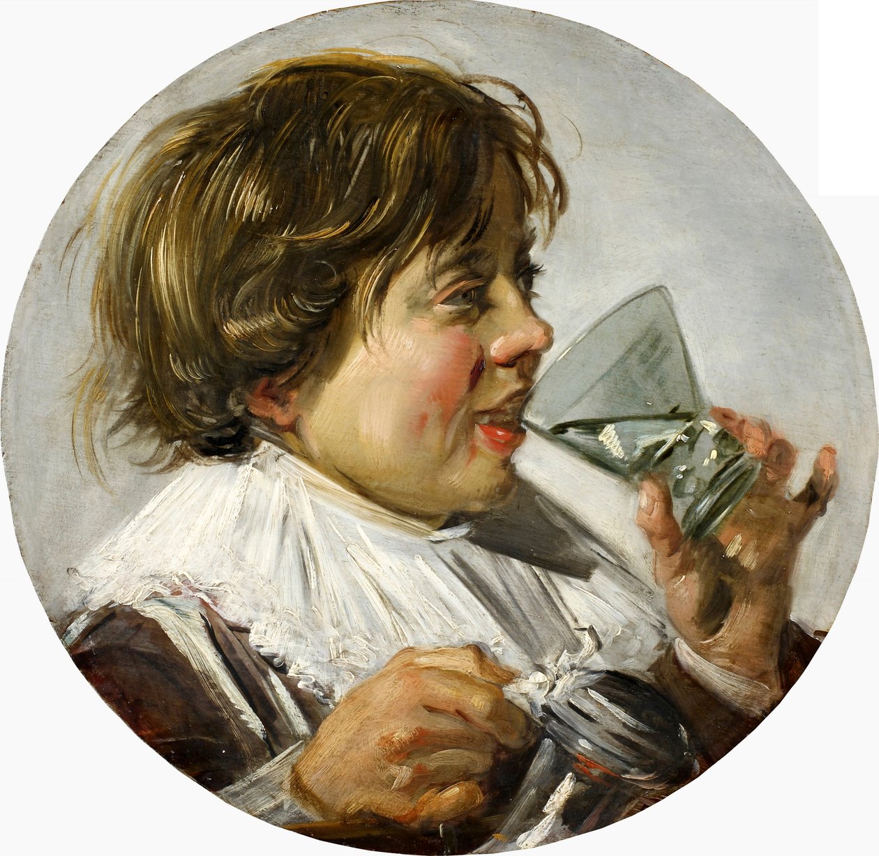 Halvlångt porträtt av en skrattande pojke med ett vinglas av Frans Hals