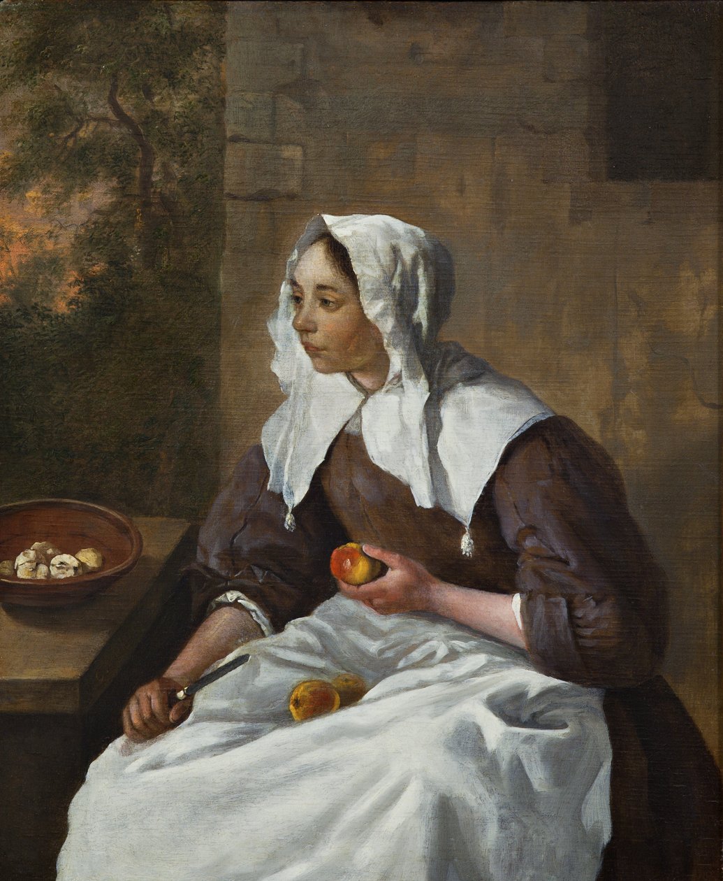 Flicka som skalar äpplen (olja på pannå) av Gabriel Metsu