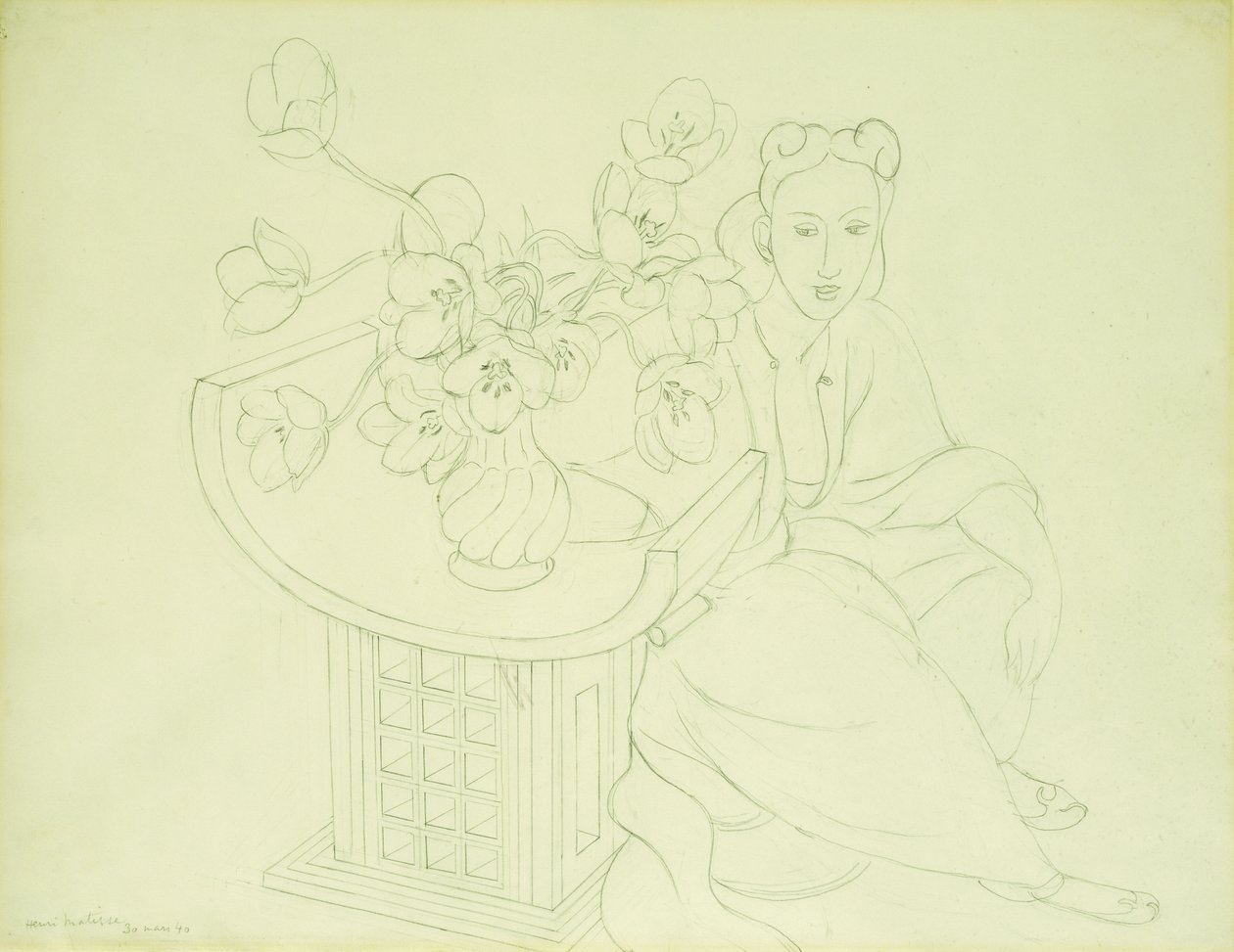 Sittande kvinna med en vas med tulpaner av Henri Matisse