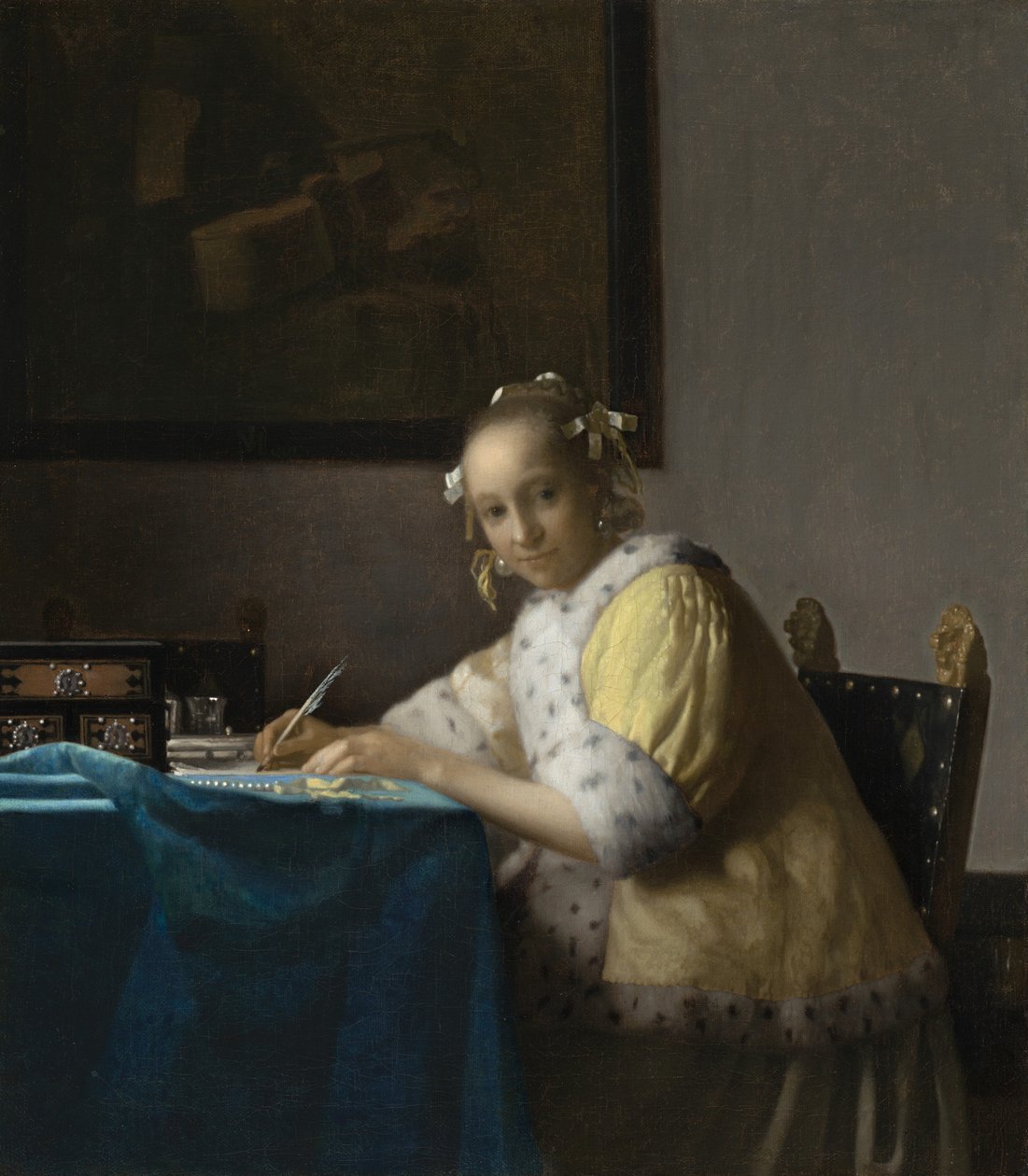En kvinna som skriver, ca. 1665. av Johannes Vermeer
