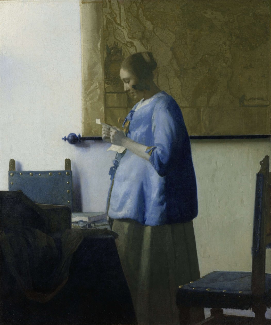 Kvinna i blått som läser ett brev av Jan Vermeer van Delft