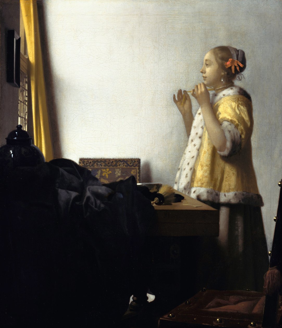 Ung kvinna med pärlhalsband av Johannes Vermeer
