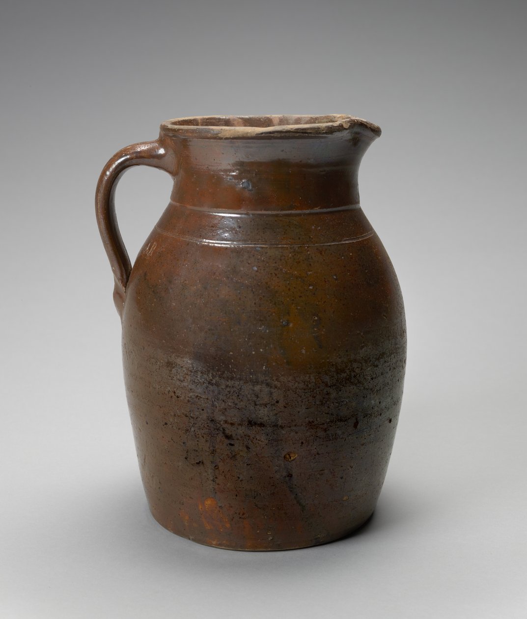 Pitcher, c. 1873-1900 (glidglaserat stengods) av Joseph C. Rushton