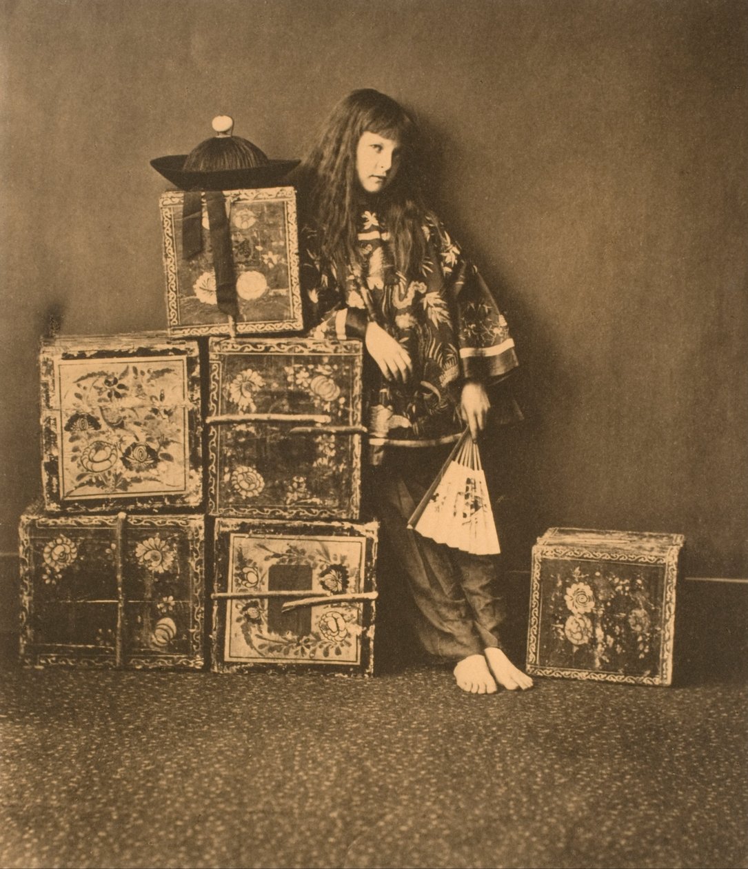 Xie Kitchin som "En kinaman" av Lewis Carroll