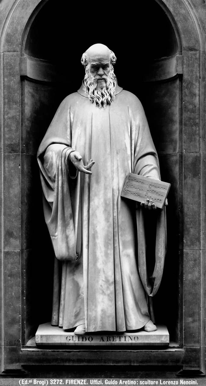Staty av Guido av Arezzo (marmor) av Lorenzo Nencini