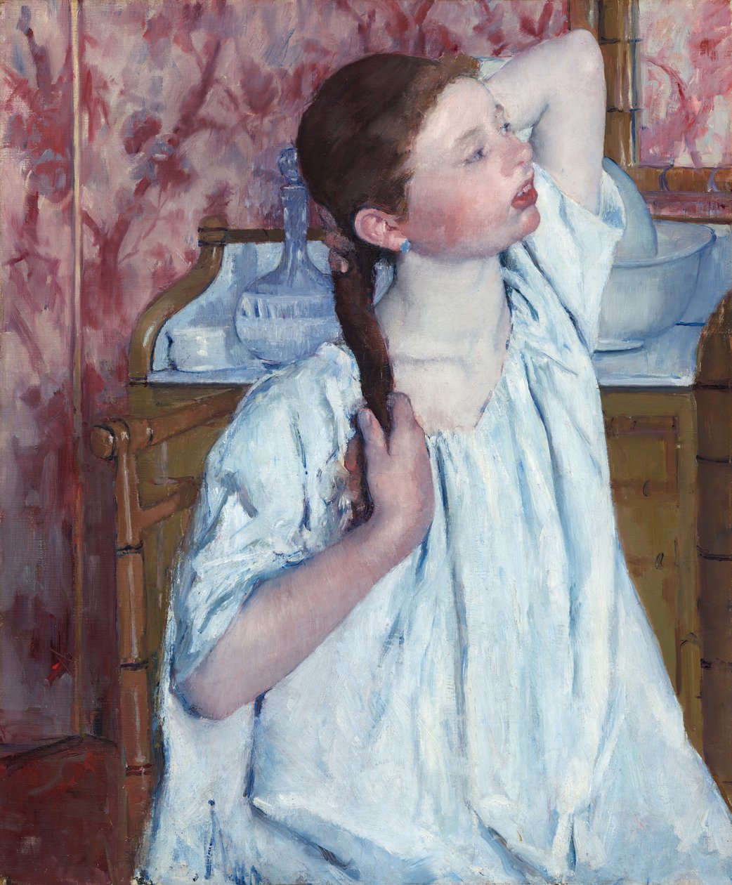 Flicka som ordnar sitt hår, 1886. av Mary Cassatt