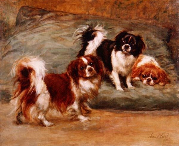 Tre King Charles Spaniels på en kudde av Maud Earl