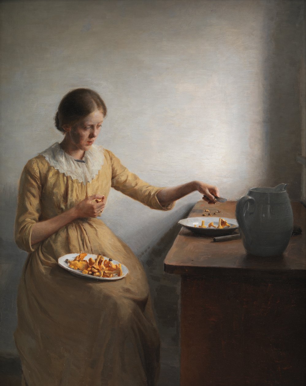 En ung flicka som förbereder kantareller av Peter Vilhelm Ilsted
