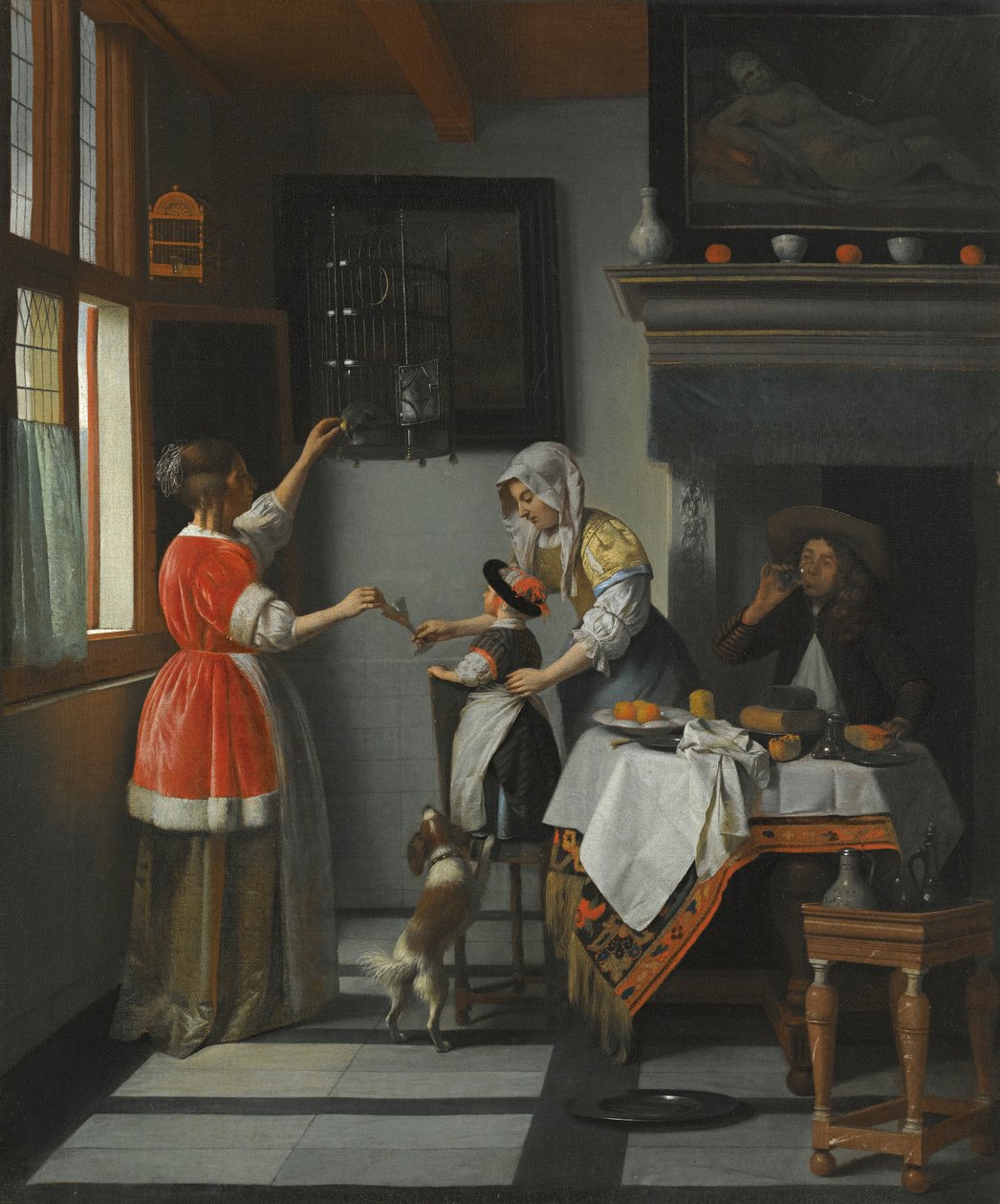 Interiör med ett barn som matar en papegoja av Pieter de Hooch