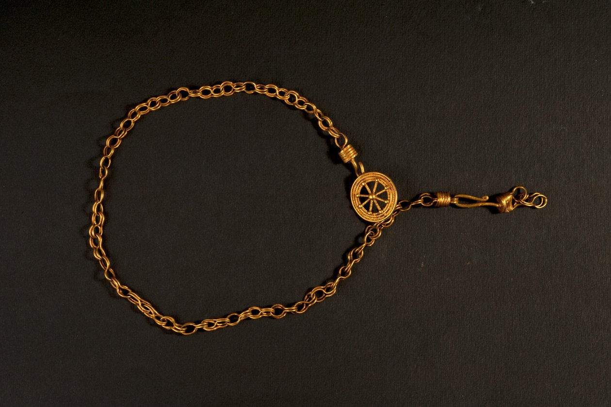 Halsband (guld) av Roman