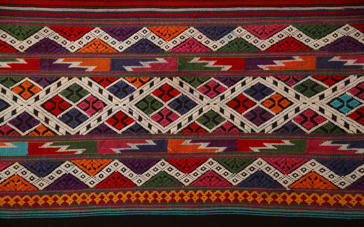 Detalj av Tai Lu-tyg (textil) av School Thai