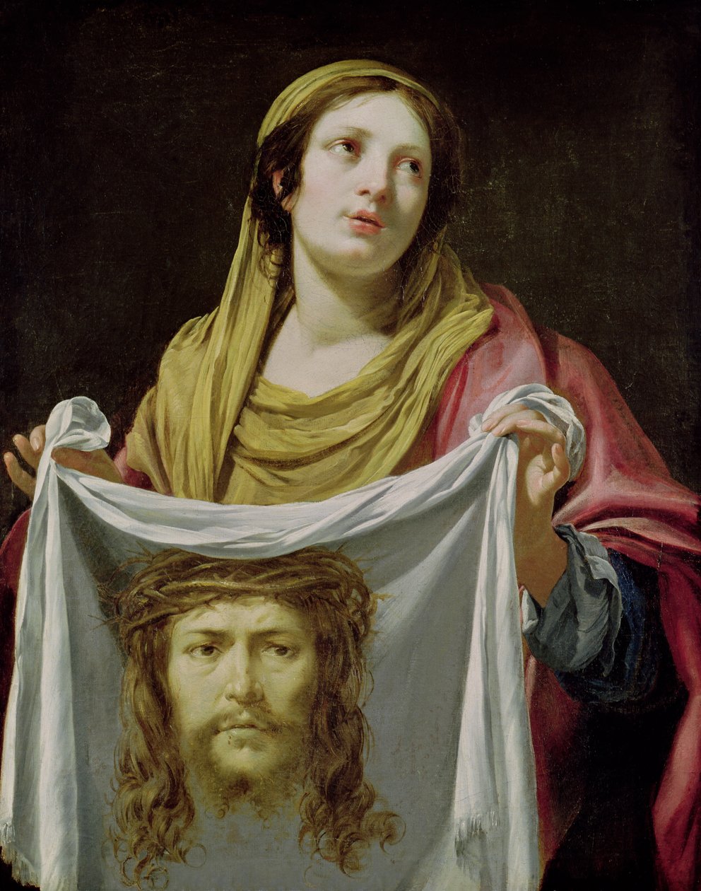 St. Veronica som håller den heliga höljet av Simon Vouet