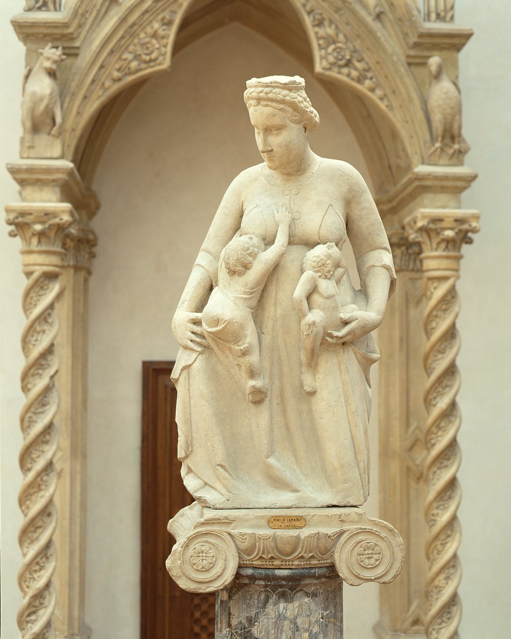 Välgörenhet, ca 1320 (marmor) av Tino di Camaino