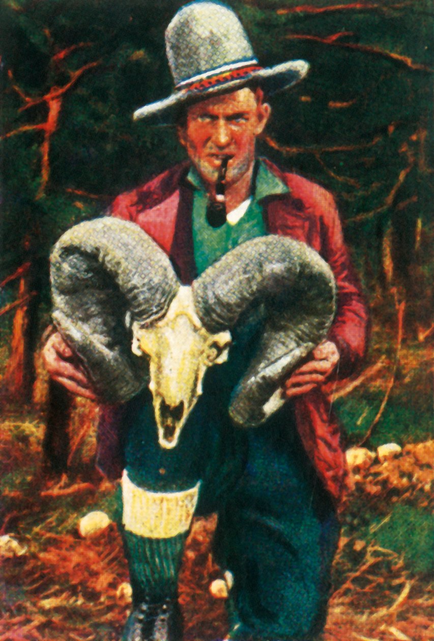 Troféjägare som håller Bighorn-fårskalle, c1928. av Unbekannt