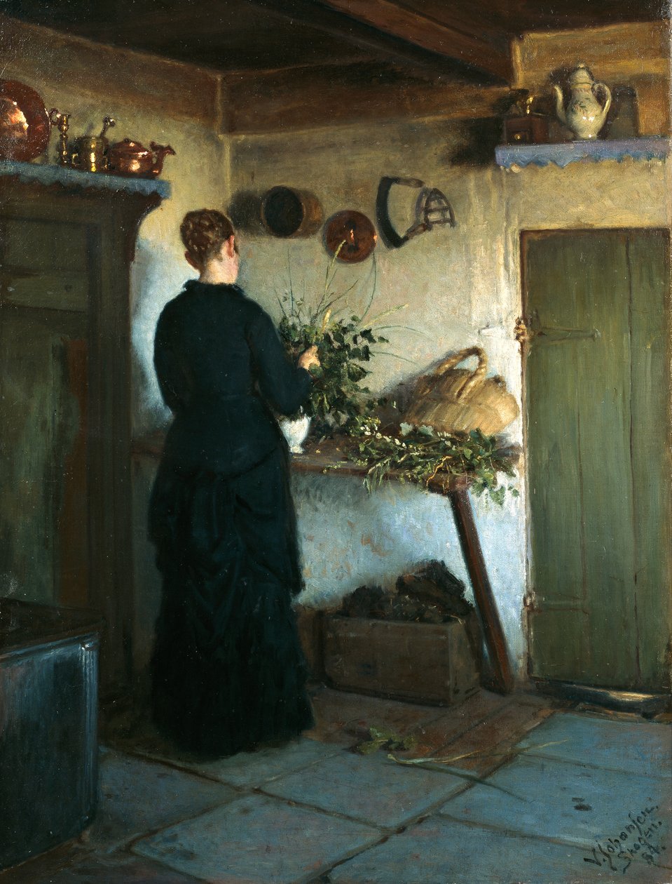 Köksinteriör. Konstnärens fru arrangera blommor av Viggo Johansen