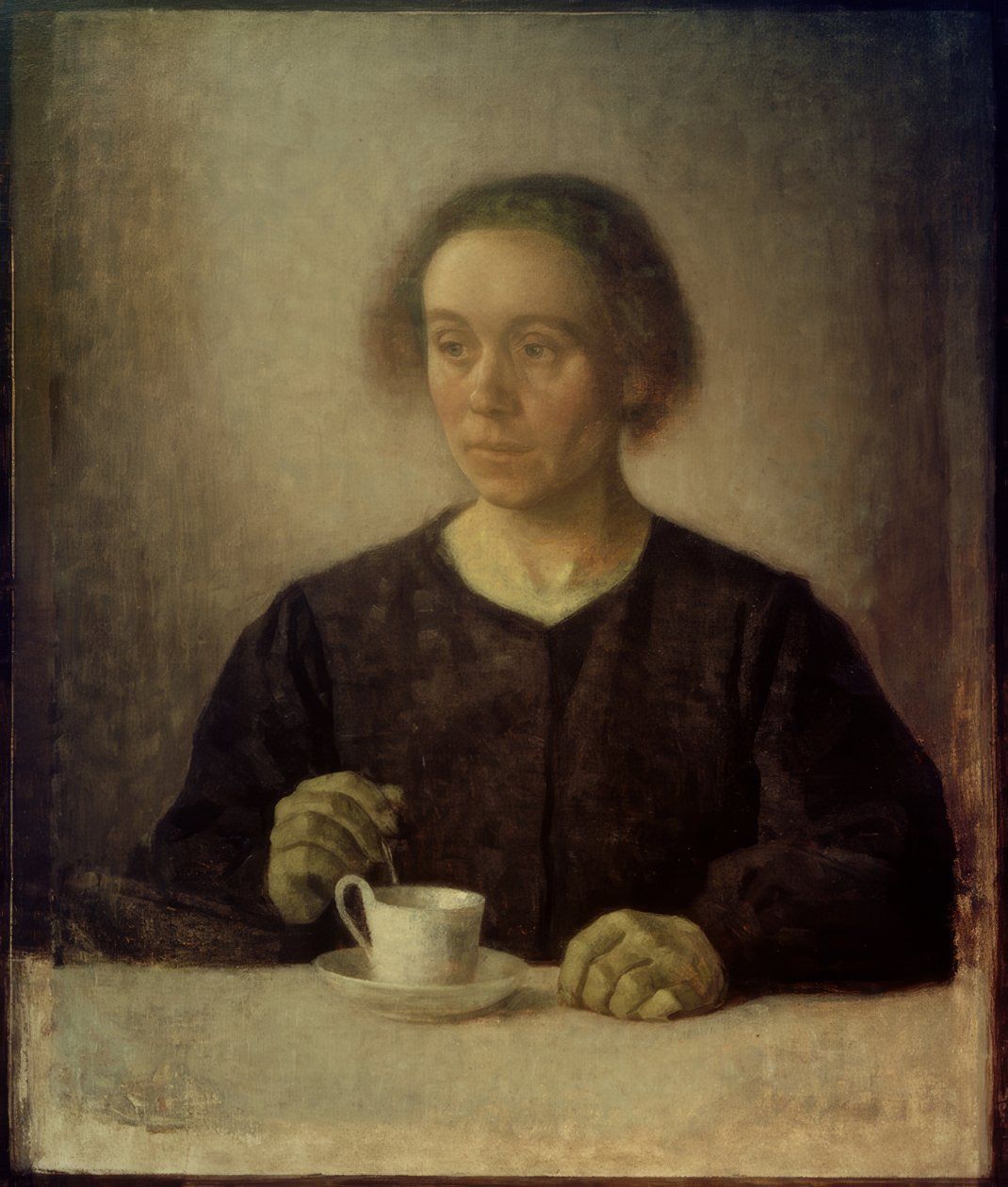 Konstnärens fru med tekopp av Vilhelm Hammershoi
