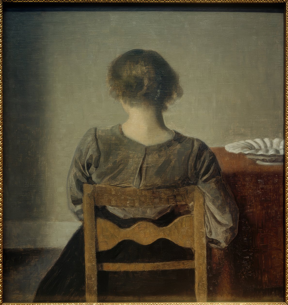 Ung kvinna. Resten av Vilhelm Hammershoi