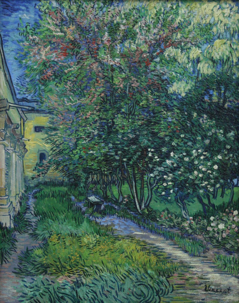 De tuin van de inrichting in Saint-Rémy av Vincent van Gogh