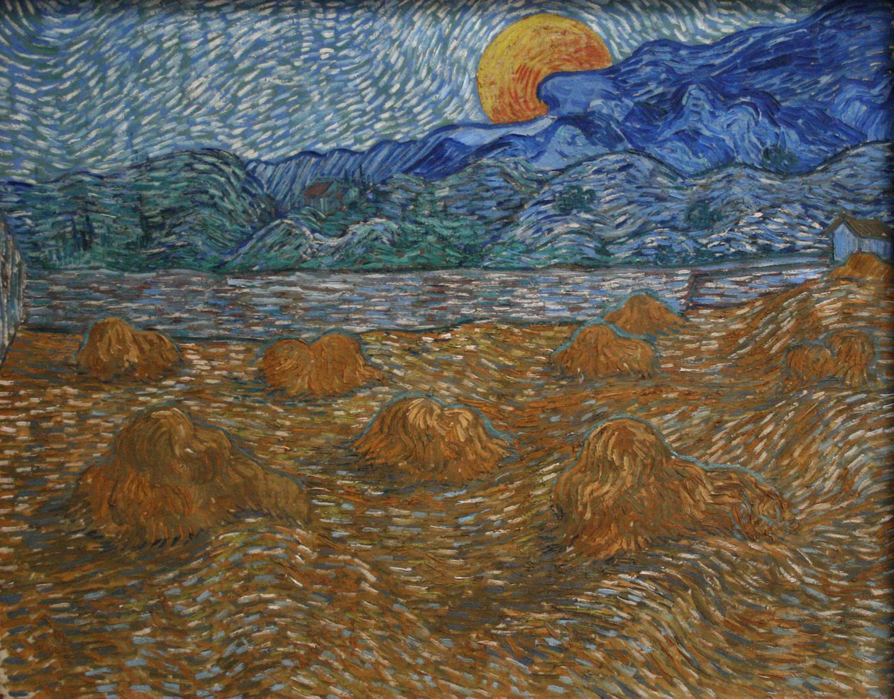 Landschap met korenschelven en opkomende maan av Vincent van Gogh