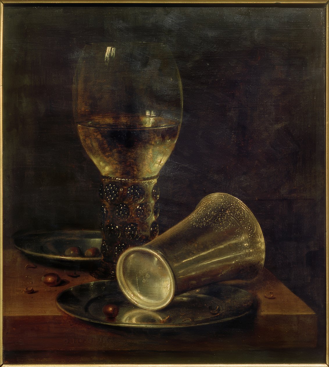 Stilleben med en vält drickskopp av Willem Claesz. Heda