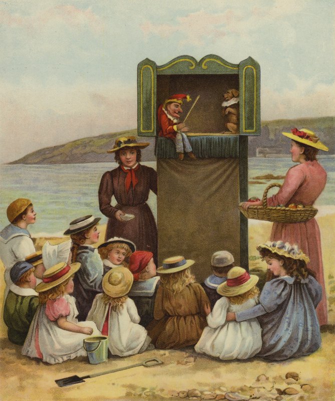 Barn tittar på en Punch and Judy-show på stranden av English School