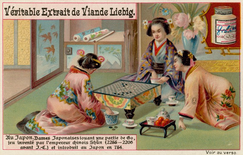 Japanska kvinnor spelar brädspel av European School