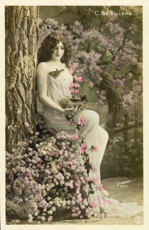 Flicka med blommor av French Photographer